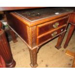 Reproduction mahogany and crossbanded two drawer lamp table raised on square moulded supports in