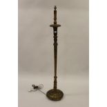 Carved gilt wood lamp standard, gilt metal and pottery oil lamp, adapted for use with electricity,