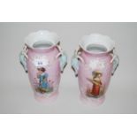 Pair of 19th Century French baluster form vases with mask head handles decorated with figures and
