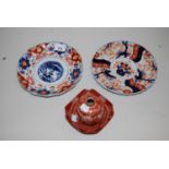 Japanese Kutani ink bottle on stand together with two Imari plates