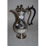 Victorian Birmingham silver baluster form pedestal hot water pot with ebonised handle and floral