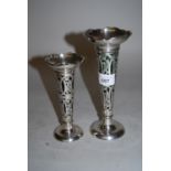 Two silver spill vases with pierced decoration and green glass liners, makers mark T.B.