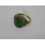 9ct Gold and jade set ring with carved setting and shoulders In good condition, no visible damage or