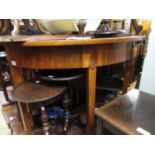 George III mahogany D-end dining table having two extra leaves on square tapering supports