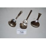 Two 19th Century shovel form silver tea caddy spoons together with a 19th Century silver Shell and