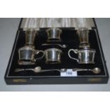 Cased six piece Birmingham silver condiment set (one glass liner at fault)