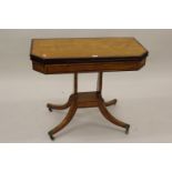Regency satinwood rosewood crossbanded and line inlaid fold-over card table, the baize lined top