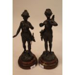 Nicolas Lecornet, pair of 19th Century French dark patinated bronze figures of girl warriors,