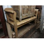 Late 19th / early 20th Century oak and pine bench having panelled back with spindle open arms on