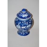 Chinese blue and white prunus blossom baluster form jar with cover, signed with six character mark