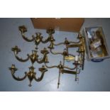 Two sets of three brass two branch wall lights together with a quantity of brass hinges etc