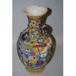 Large Kyoto two handled baluster form vase decorated with an all-over design of figures in a