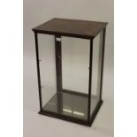 Pair of mahogany four glass shop display cabinets by Rudduck and Co., London, each with a single