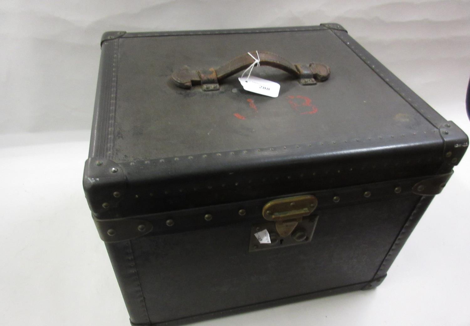 Malles Goyard, a brass mounted black fibre square trunk / hat box, stamped to the catch and labelled