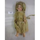 Small Goebel bisque headed doll marked 14/0 Germany with sleeping eyes and open mouth on a jointed