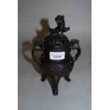 Chinese dark patinated bronze two handled censer with dog of foe lid, 8ins high