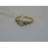 18ct Gold diamond solitaire ring with diamond set shoulders Weight = 2.2g