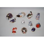 Group of eleven various Royal Crown Derby paperweights in the form of animals and birds