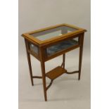 Edwardian mahogany and satinwood crossbanded four glass bijouterie cabinet on square tapering