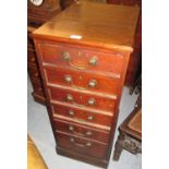Pair of 19th Century mahogany pedestals each having plain moulded top above six drawers with brass