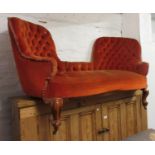 Victorian walnut and button upholstered double chair back sofa raised on carved walnut cabriole