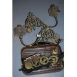 Two 19th Century brass wall mounted oil lamps with glass wells together with a small quantity of