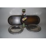 Set of eight Continental pewter plates, pair of reproduction metal candle stands and a