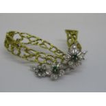 18ct Two colour gold floral spray brooch set emeralds and diamonds