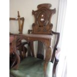 19th Century oak hall chair having carved back and wooden seat on turned supports (at fault)