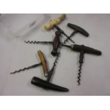 Six various corkscrews including: bone, wooden and horn handled