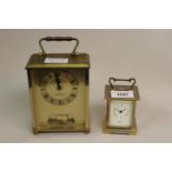 Miniature modern brass cased carriage clock by Angelus (at fault) together with a brass cased quartz