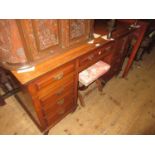 James Shoolbred, late 19th / early 20th Century mahogany Aesthetic movement desk having simulated
