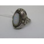 Silver and opal set dress ring of Arts and Crafts design, the setting in the form of flower heads