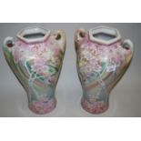 Pair of early 20th Century Japanese hexagonal baluster form vases decorated with butterflies and
