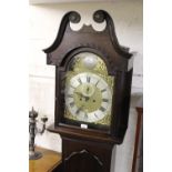 George III oak longcase clock, the broken arch hood above shaped panel door and plinth base, the