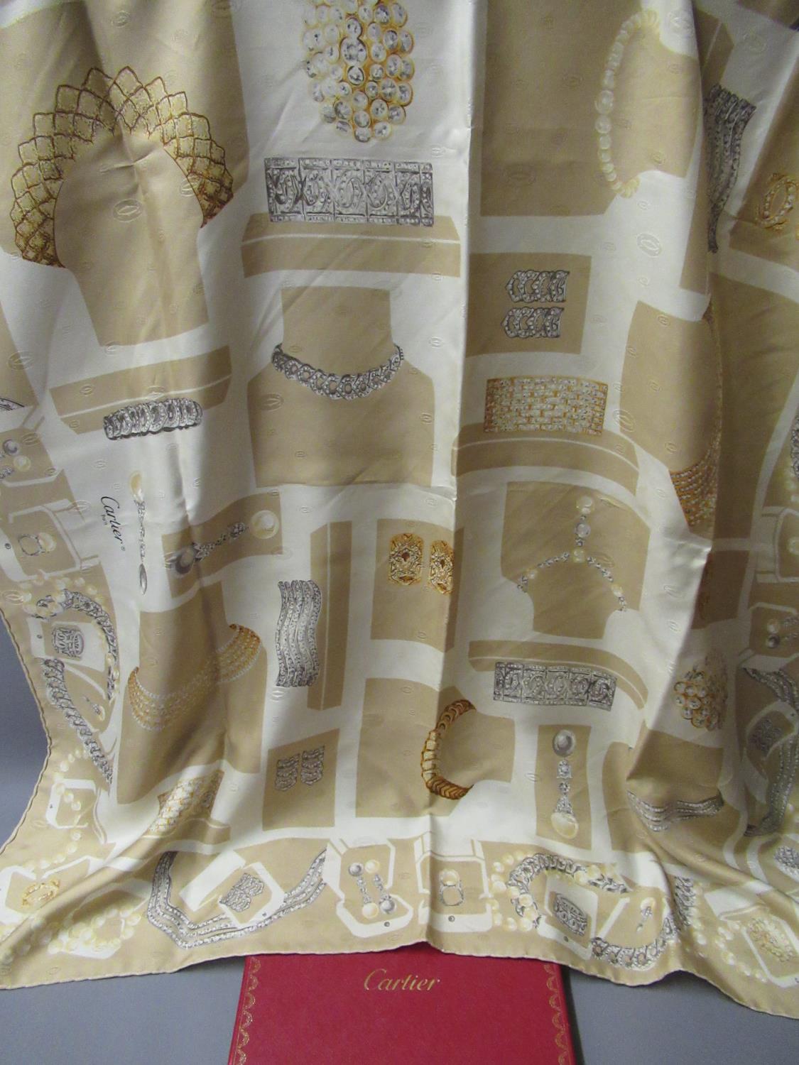 Cartier, ladies beige silk scarf, 86cms x 86cms, in original box with authenticity card Some stains