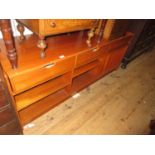 Mid 20th Century Swedish teak side cabinet with two drawers above two alcoves and a record