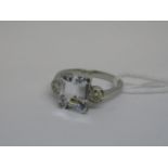 Platinum aquamarine emerald cut ring with diamond set shoulders (0.4ct/3.5ct)