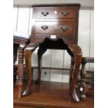 Reproduction walnut and crossbanded two drawer bedside cabinet on cabriole supports