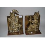 Pair of brass bookends / door stops in the form of Punch and Judy, 11ins high