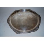 Late Victorian silver salver with a gadroon and shell pattern border, a floral engraved centre panel