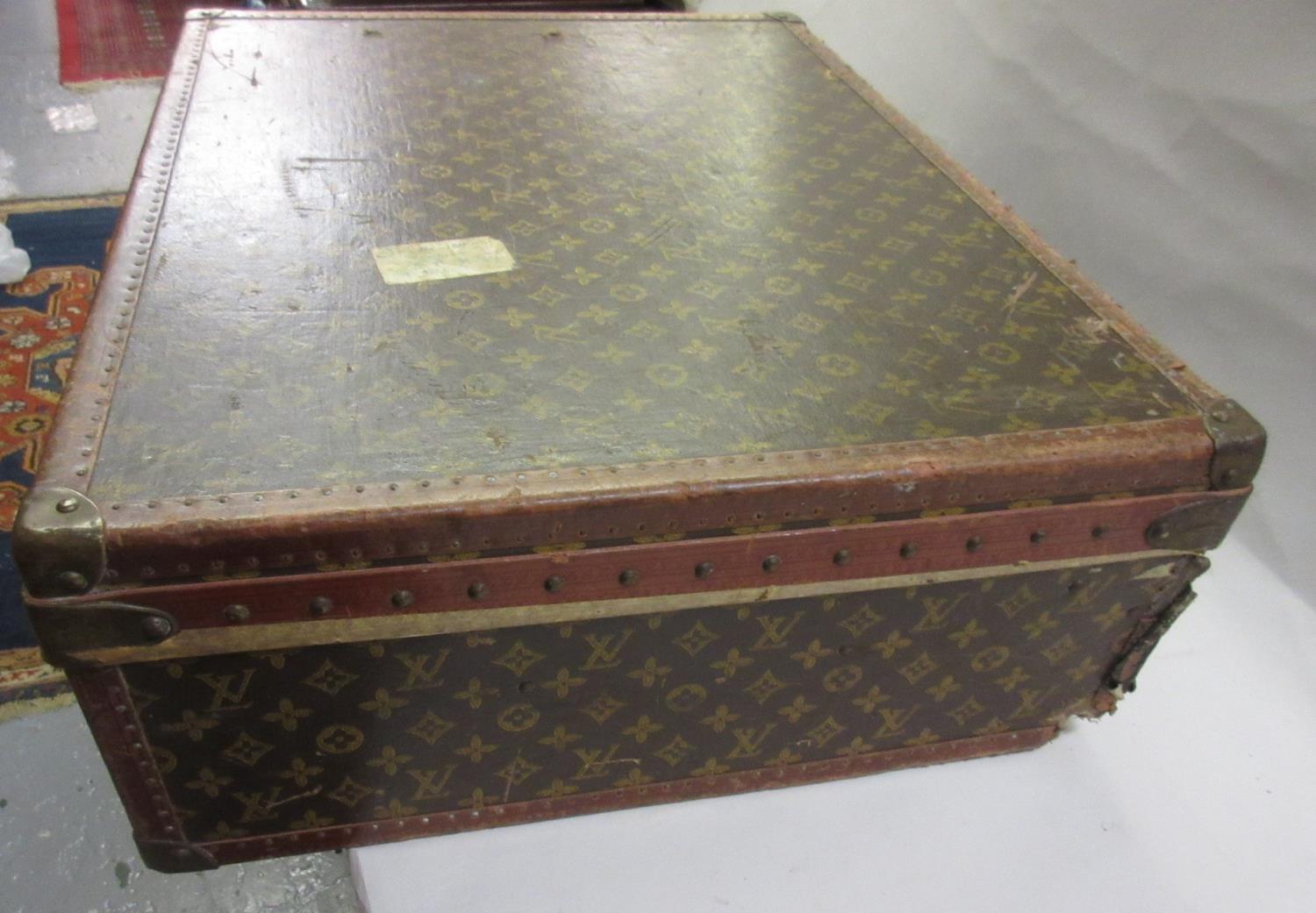 Louis Vuitton, early 20th Century suitcase decorated with the all-over monogram design, the original - Image 2 of 4