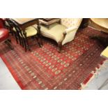 Pakistan Bokara pattern carpet on red ground