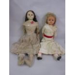 Antique wax shoulder plate doll with glass eyes, stuffed body and lace dress, 31ins tall overall