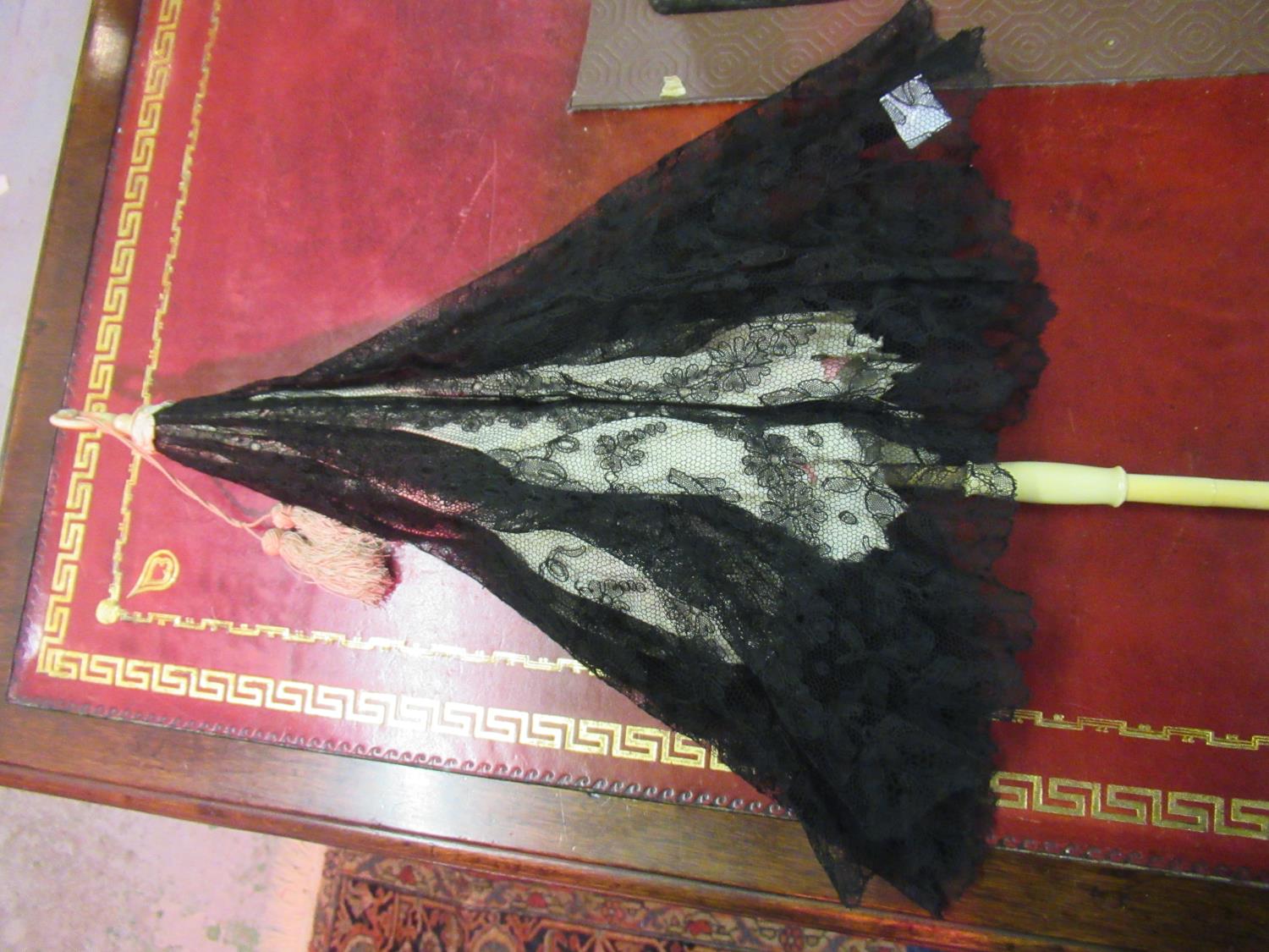 Ostrich feather fan, mother of pearl and feather fan, a black lace fan, together with an ivory and - Image 4 of 15