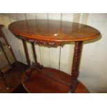 Victorian oval figured walnut occasional table raised on twin spiral twist end supports and