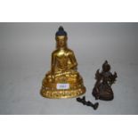 Gilt bronze figure of seated Buddha, 7.5ins high, together with two other small Indian bronze