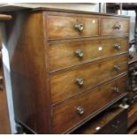 Late George III mahogany straight front chest of two short and three long drawers with circular