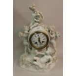 19th Century Meissen blanc de chine mantel clock mounted with figures of cherubs with grapes and a