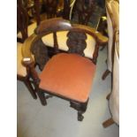 18th Century oak corner chair with later carved splat back, upholstered seat, single carved cabriole